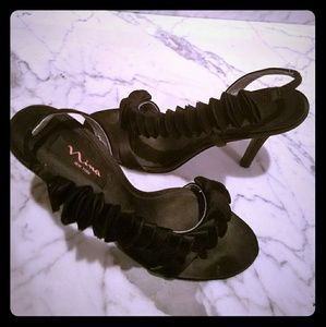 Black high heel sandal. Great for a formal event.